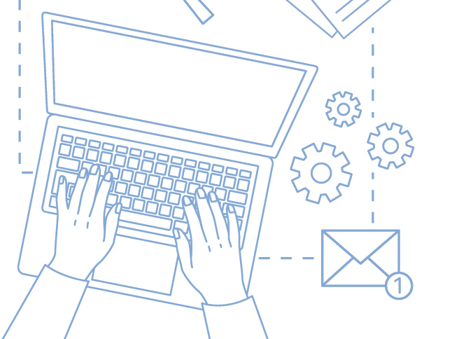 Hands typing on laptop keyboard